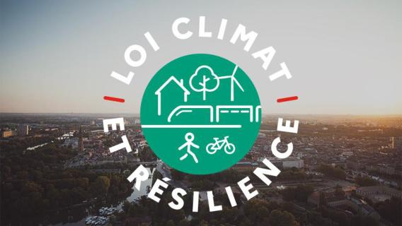 Logo de la loi sur fond de paysage urbain